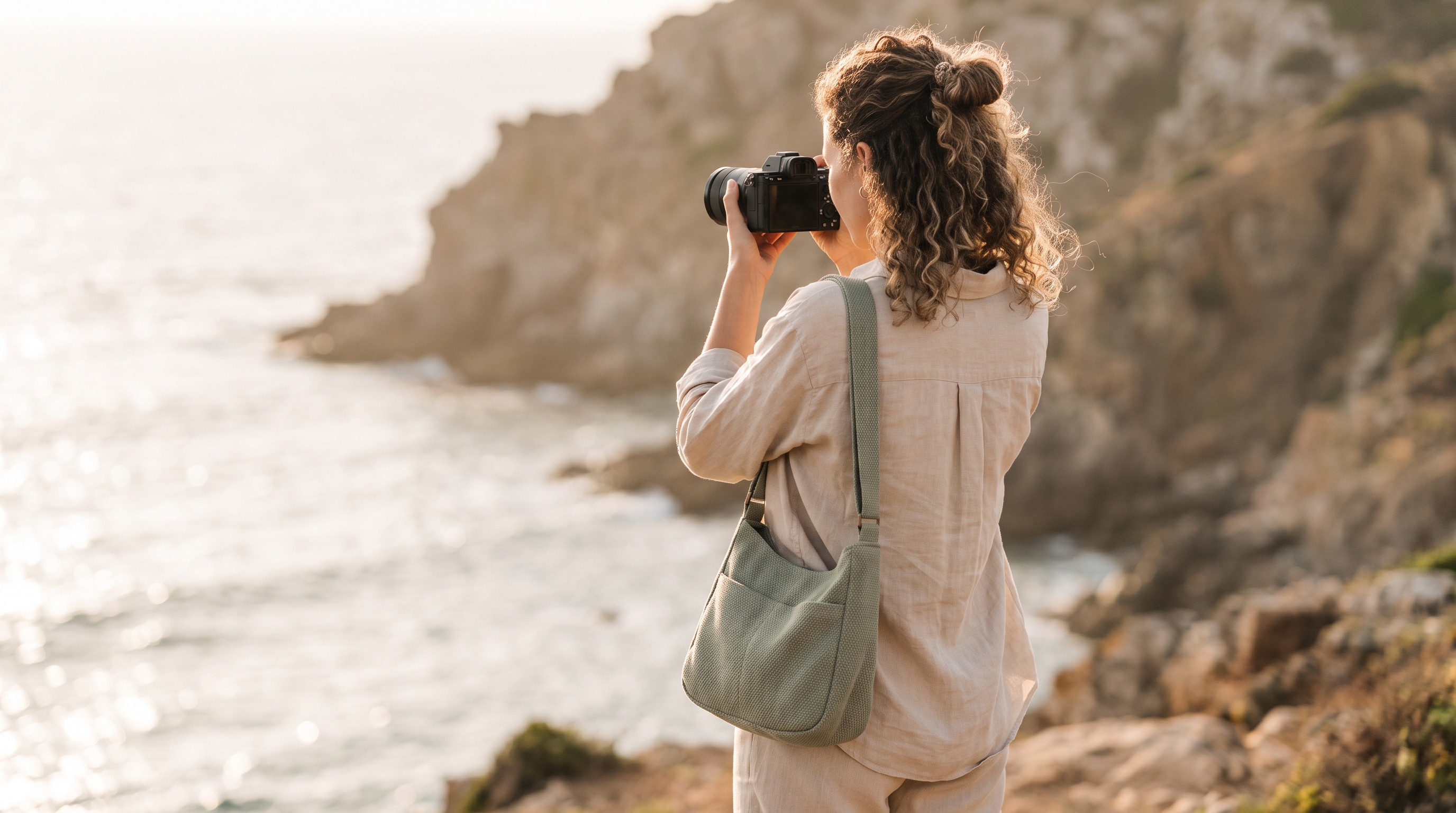 A travel creator filming content on location for a booking platform partner
